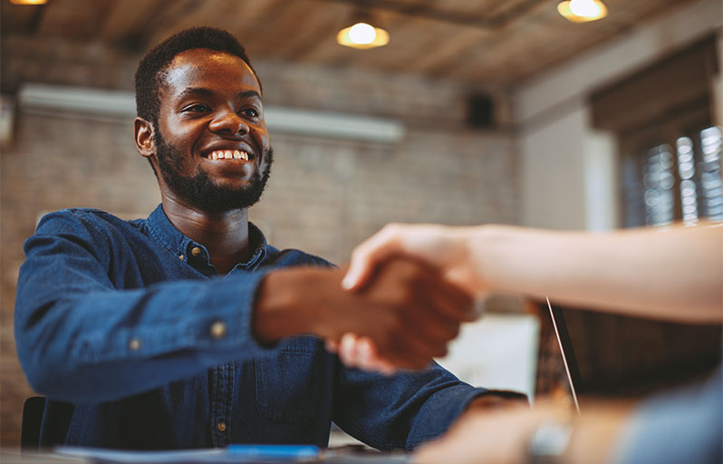 Young man shaking hands